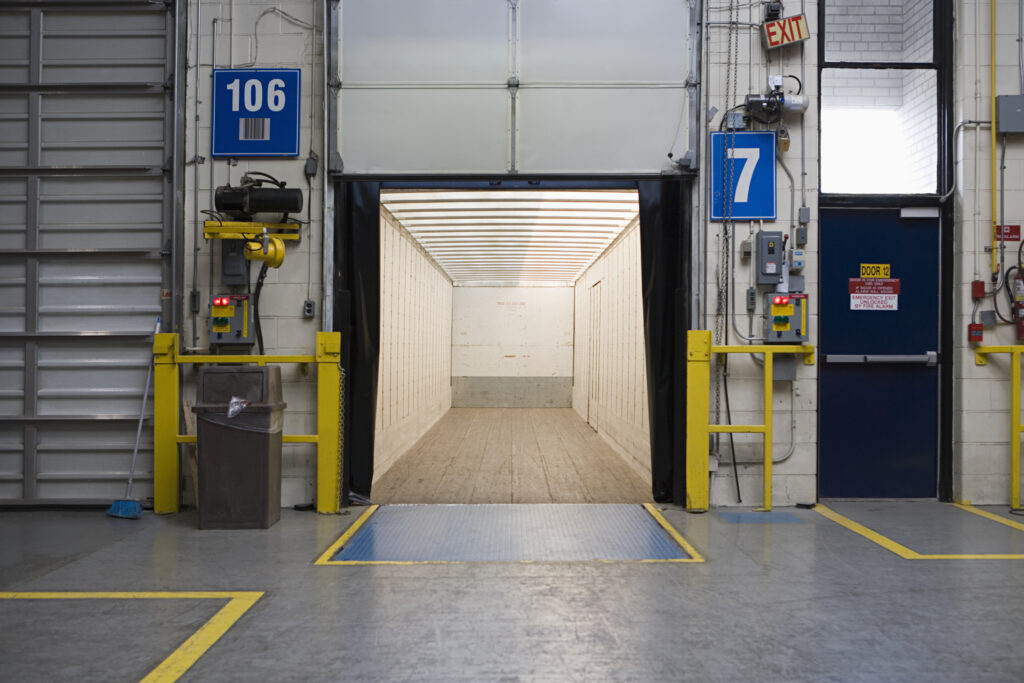 Empty loading dock bay with lift table visible.