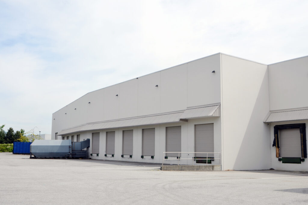 View of a generic industrial warehouse with loading several bays.